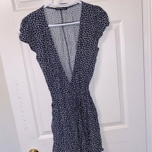 Flowy mini dress with wrap around close